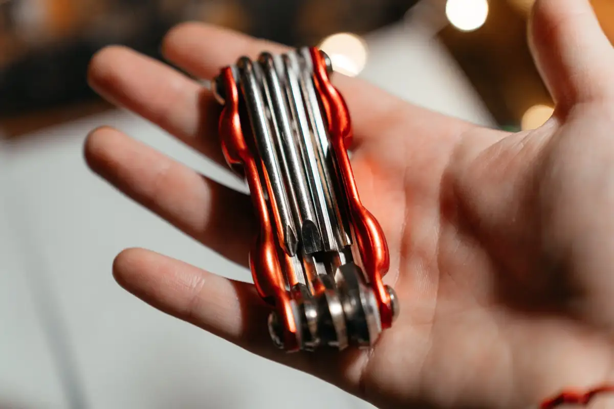 mulitool sitting in a person's hand