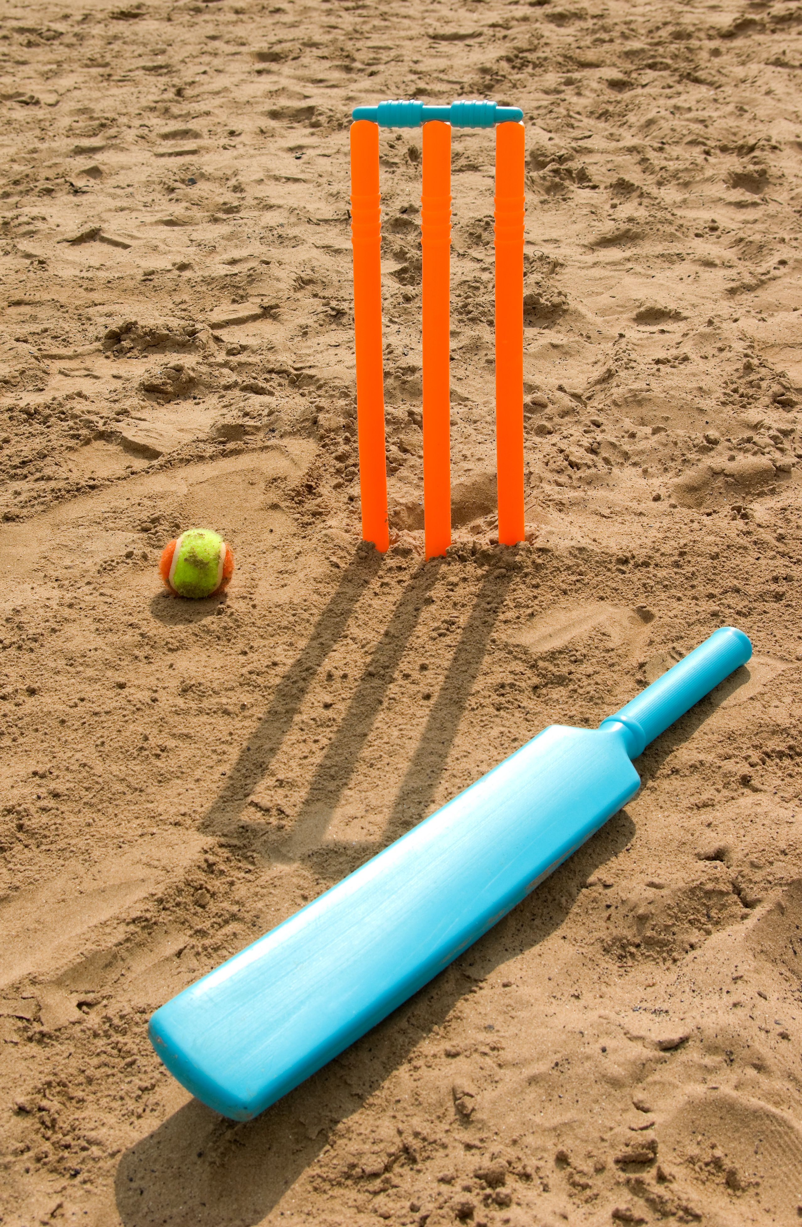 a cricket set on a beach