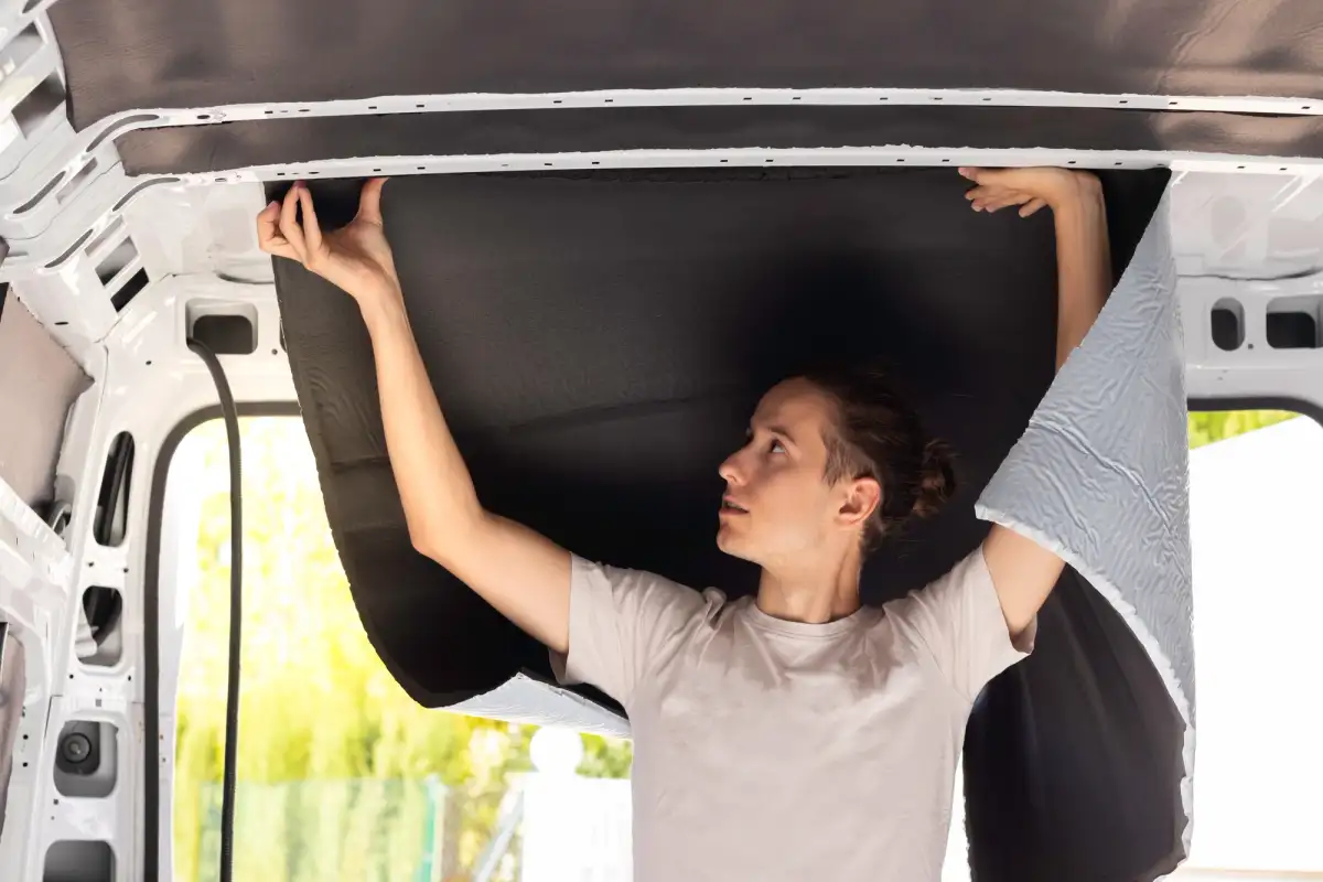 Installing insulation in a campervan