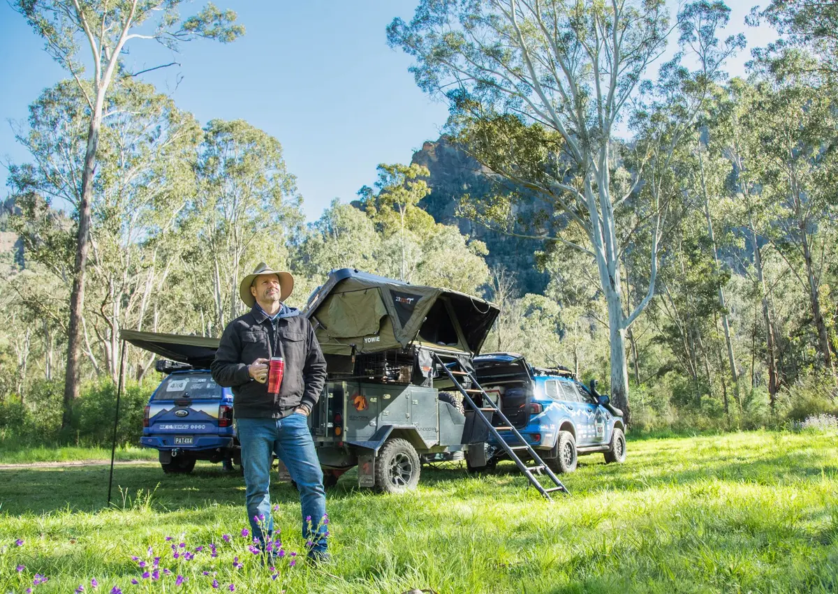 Pat Callinan and his 4X4s towing a camper trailer