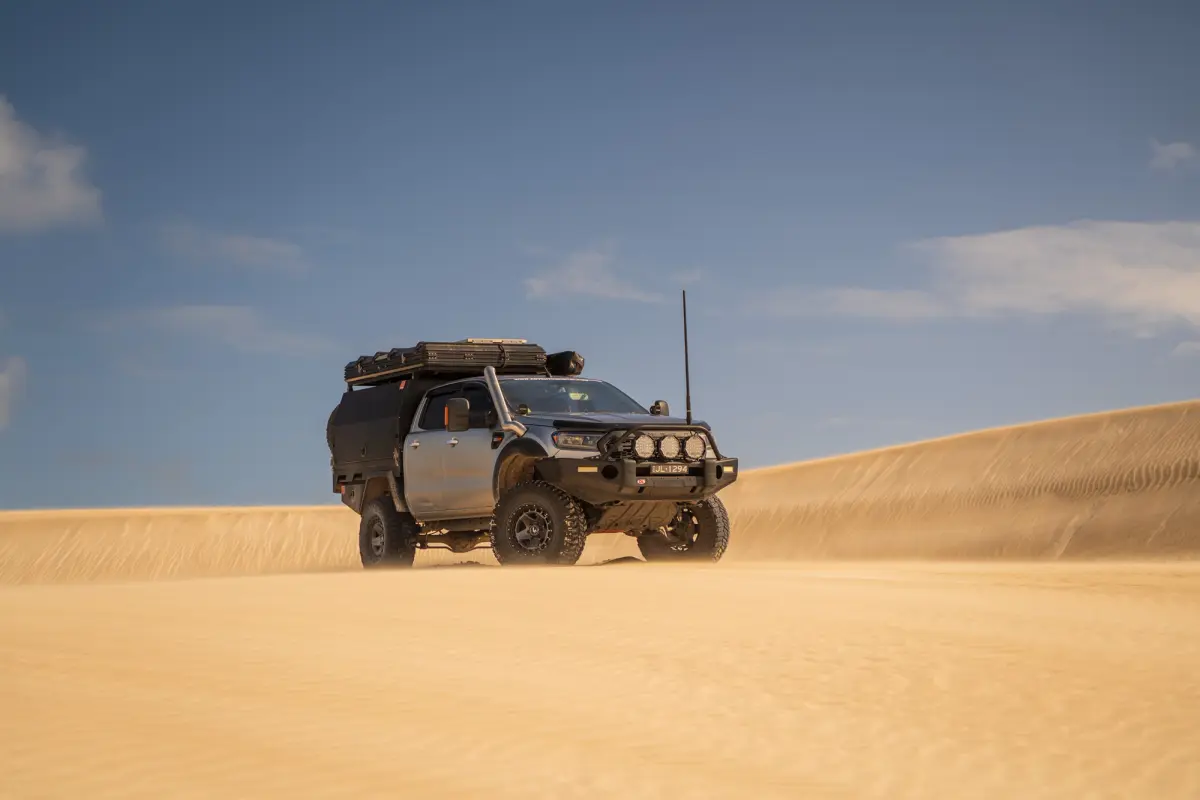 A Ford Ranger on a sand dune in the Australian Outback