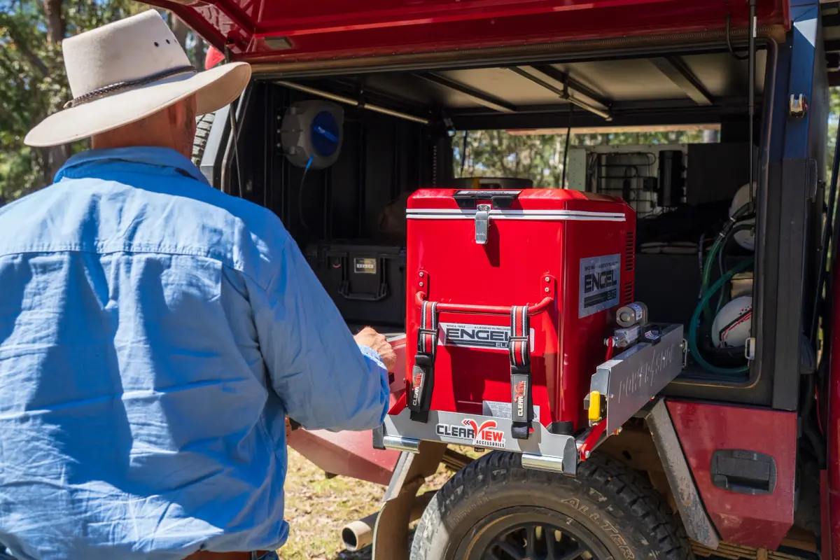 Pat Callinan pulling a fridge slide from his 4X4 Ford F-150