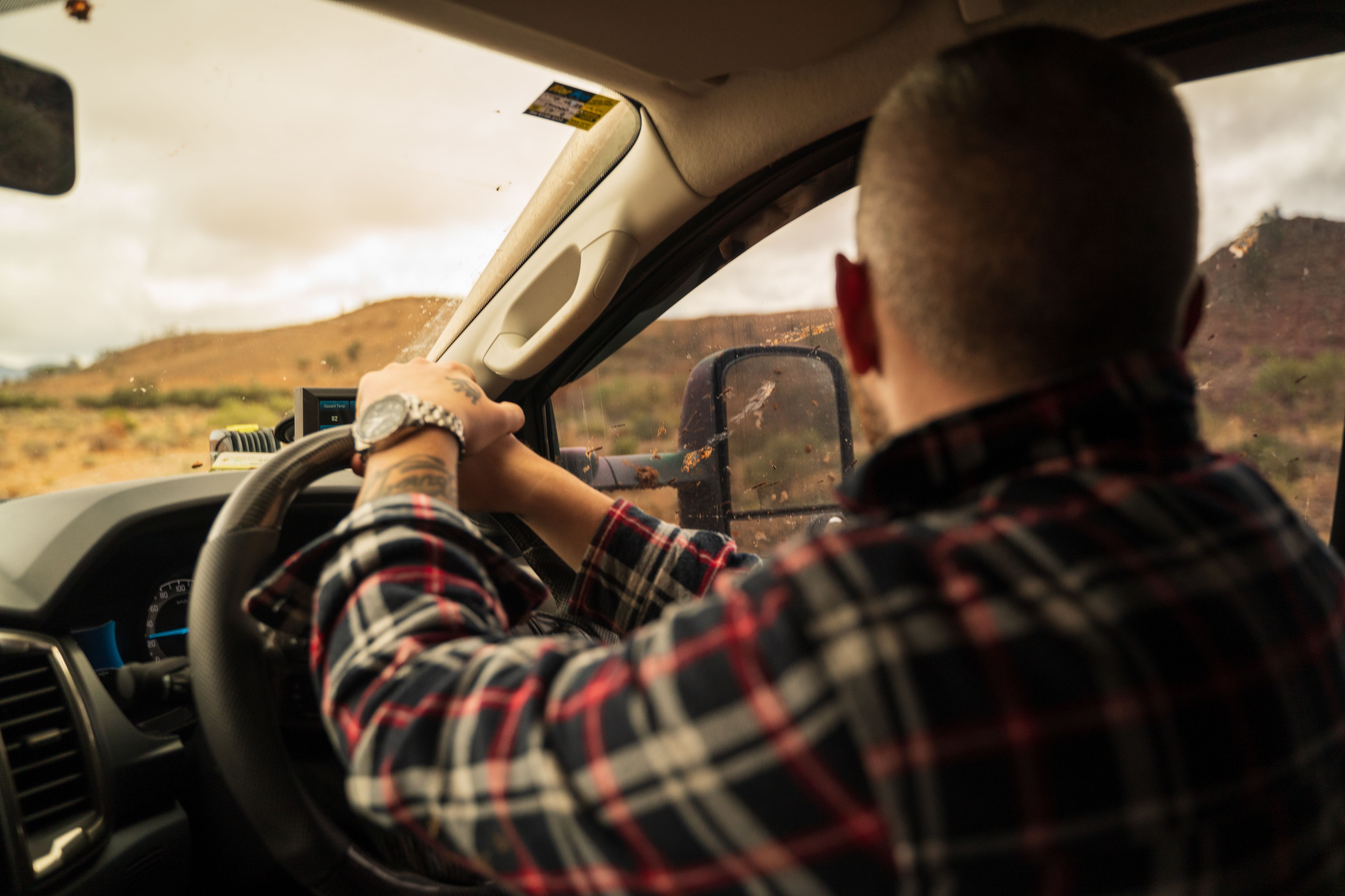 Josh Leonard driving a 4X4 in Big Desert, Victoria