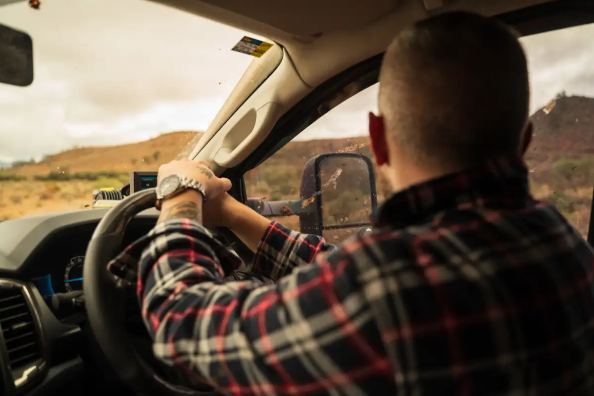 Josh Leonard driving a 4X4 in Big Desert, Victoria