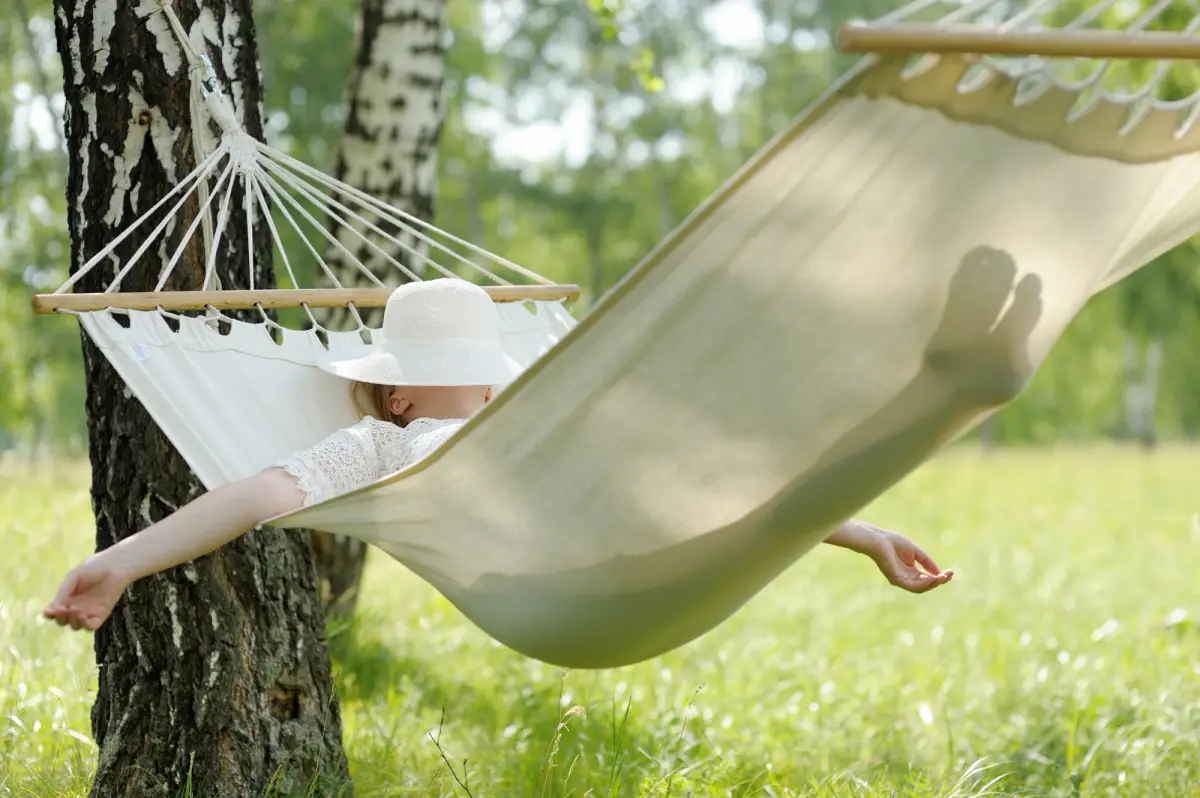 person lounging in a hammock