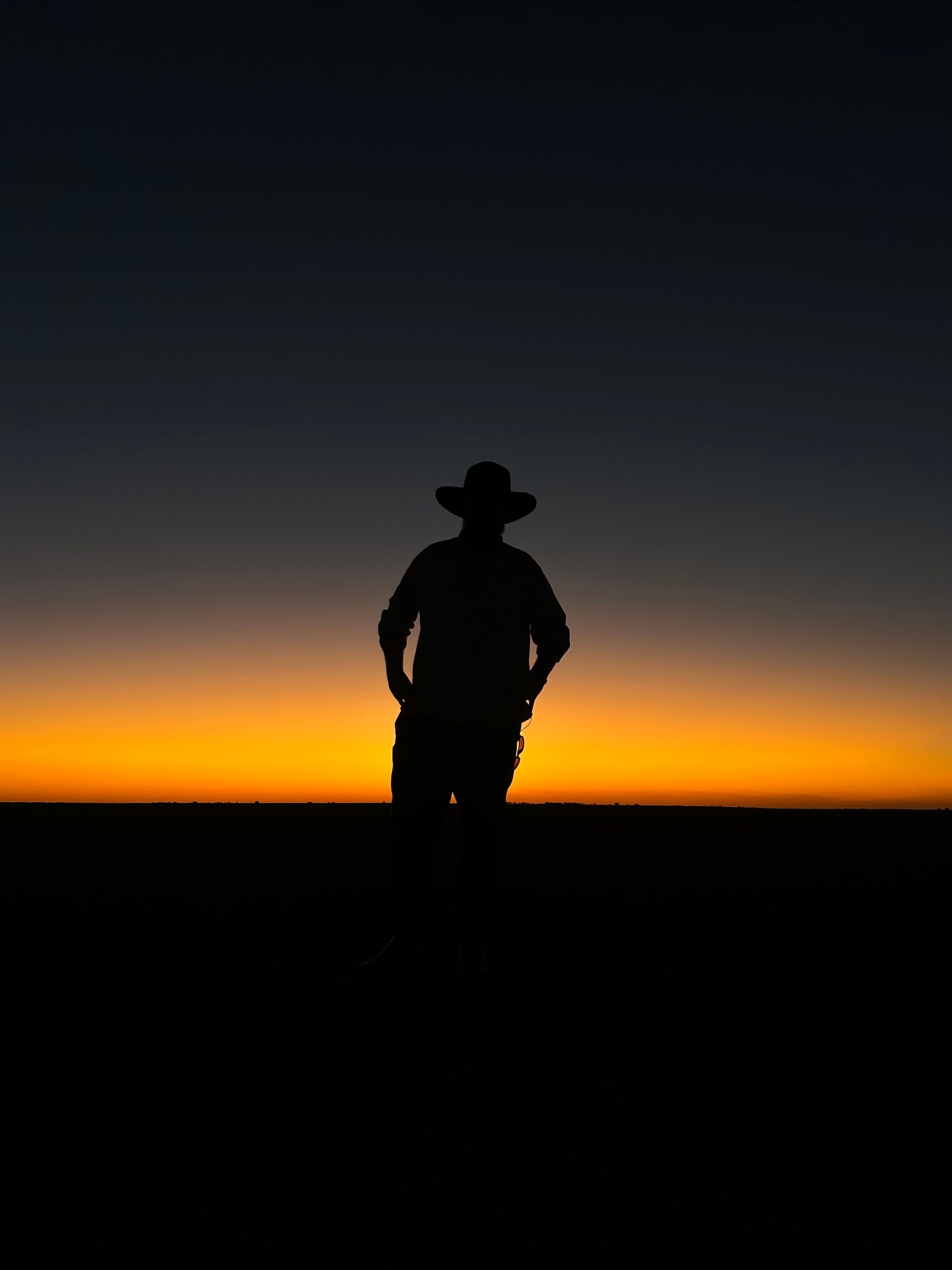 sunset on the salt pan with man's silhouette