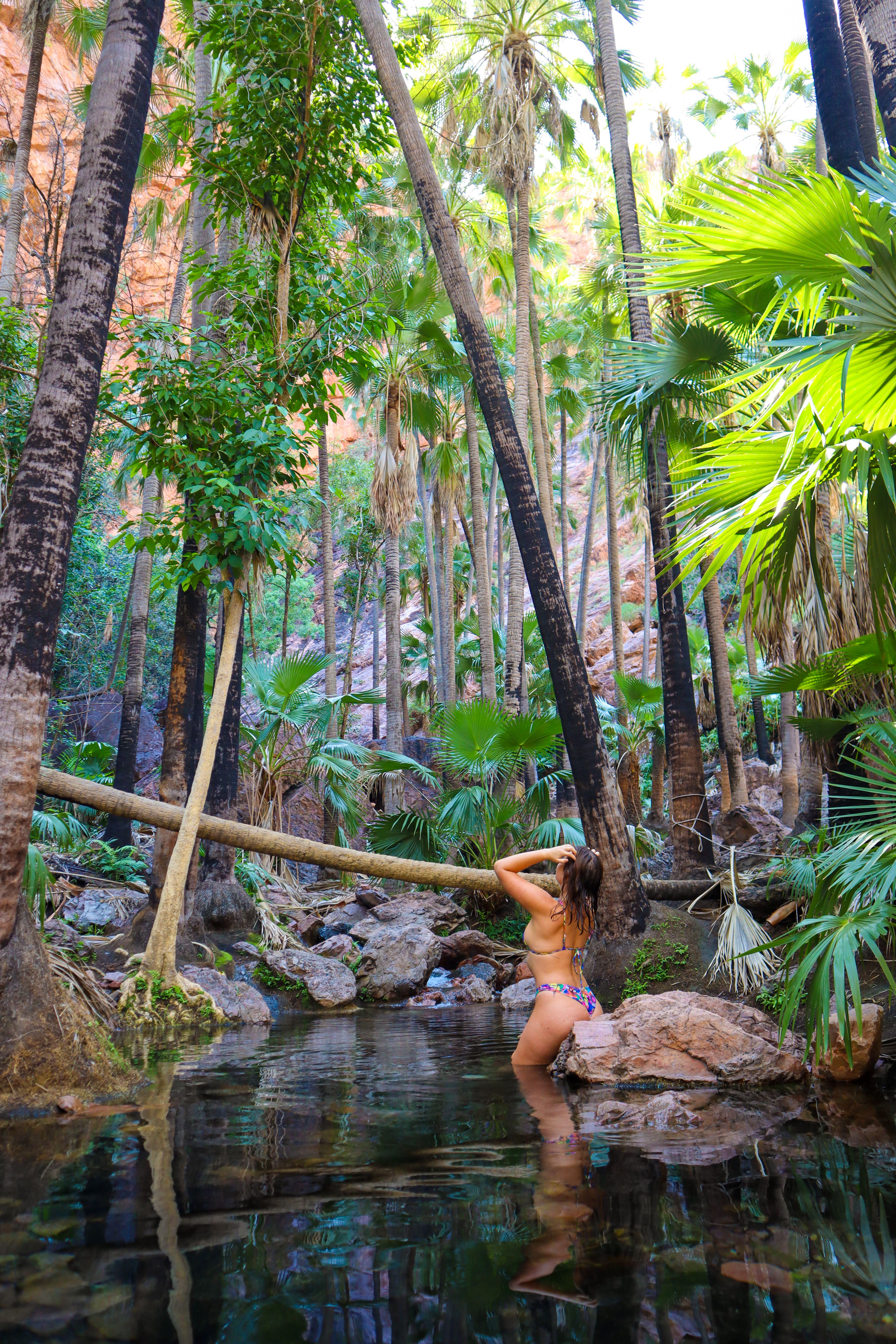 Woman swimming in Zebedee Springs, WA