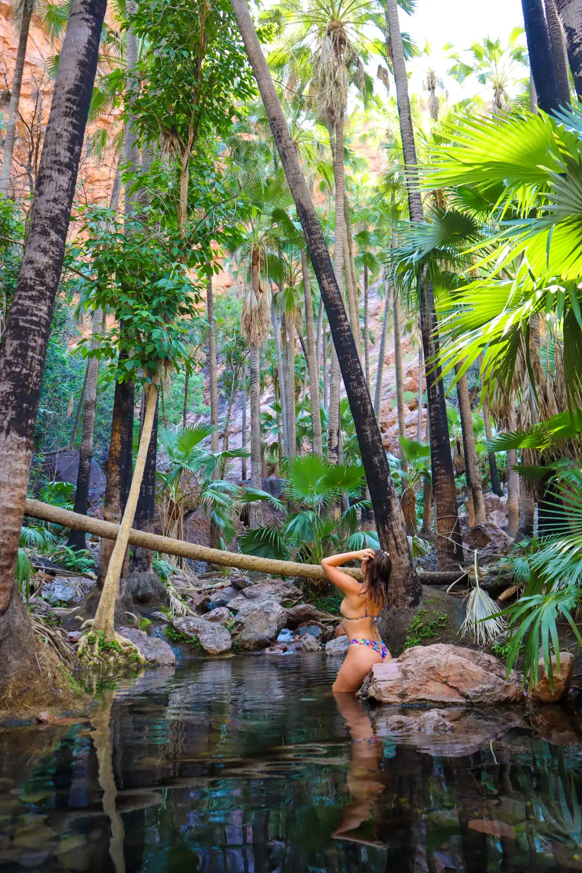 Woman swimming in Zebedee Springs, WA