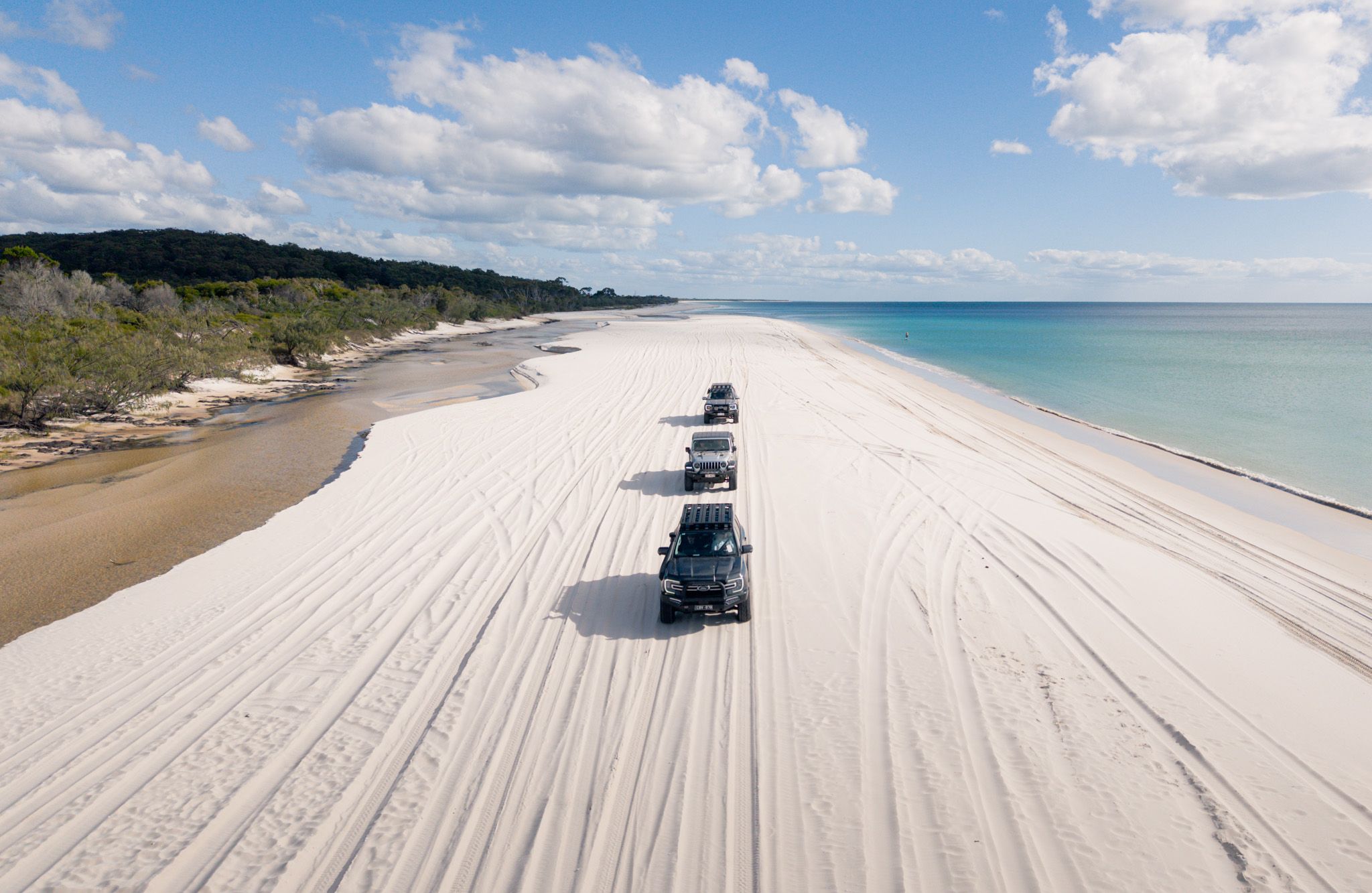 convoy of 4WDs on K'Gari 