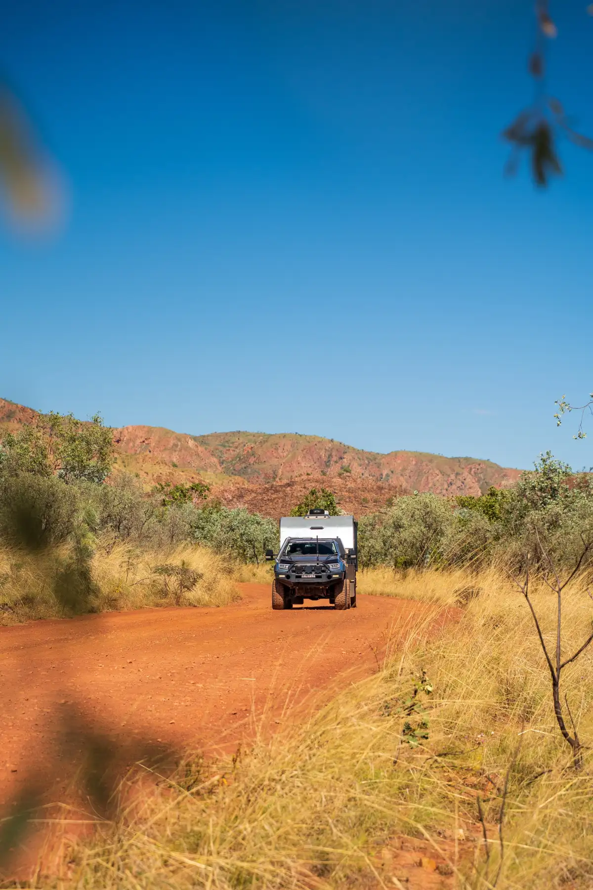 4x4 and caravan driving in red dirt