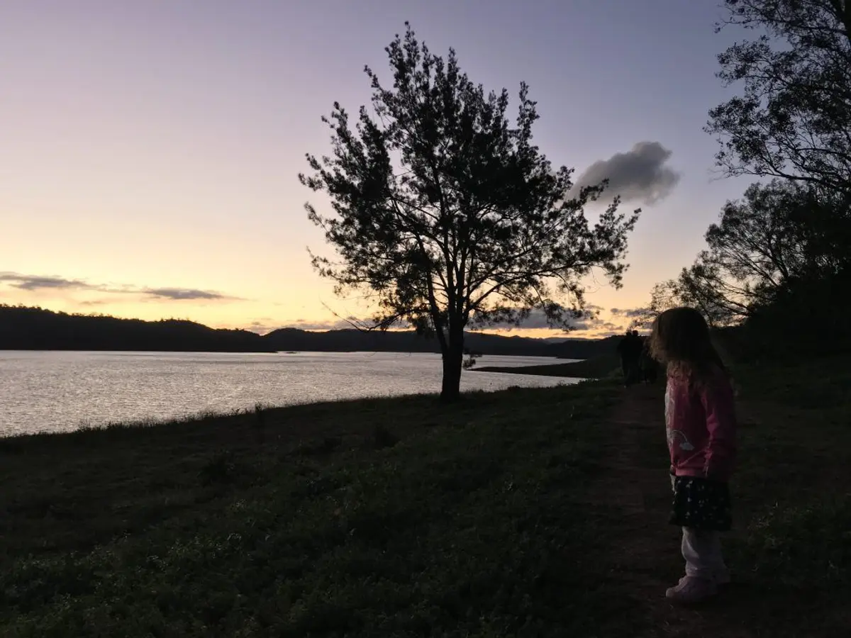 Clouds in the sky over a body of water Description automatically generated