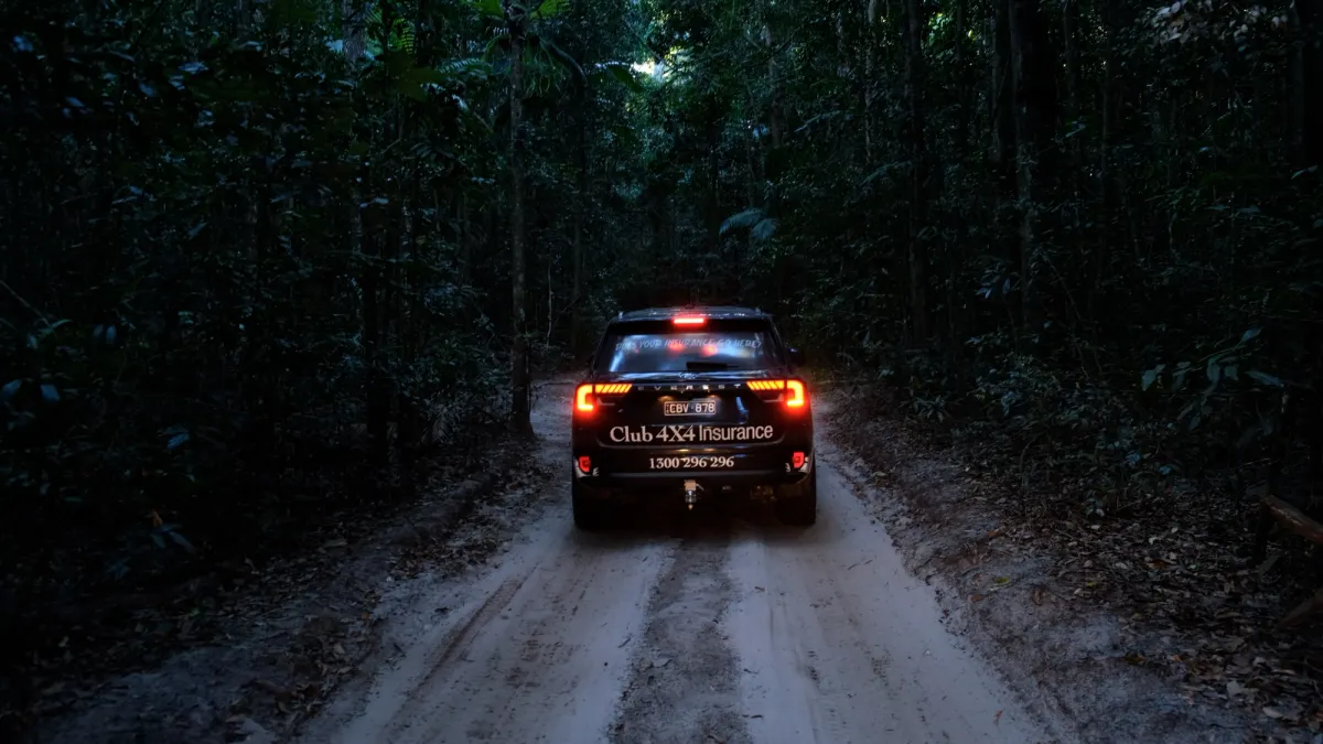 Club 4X4 branded for everest driving through forest at night