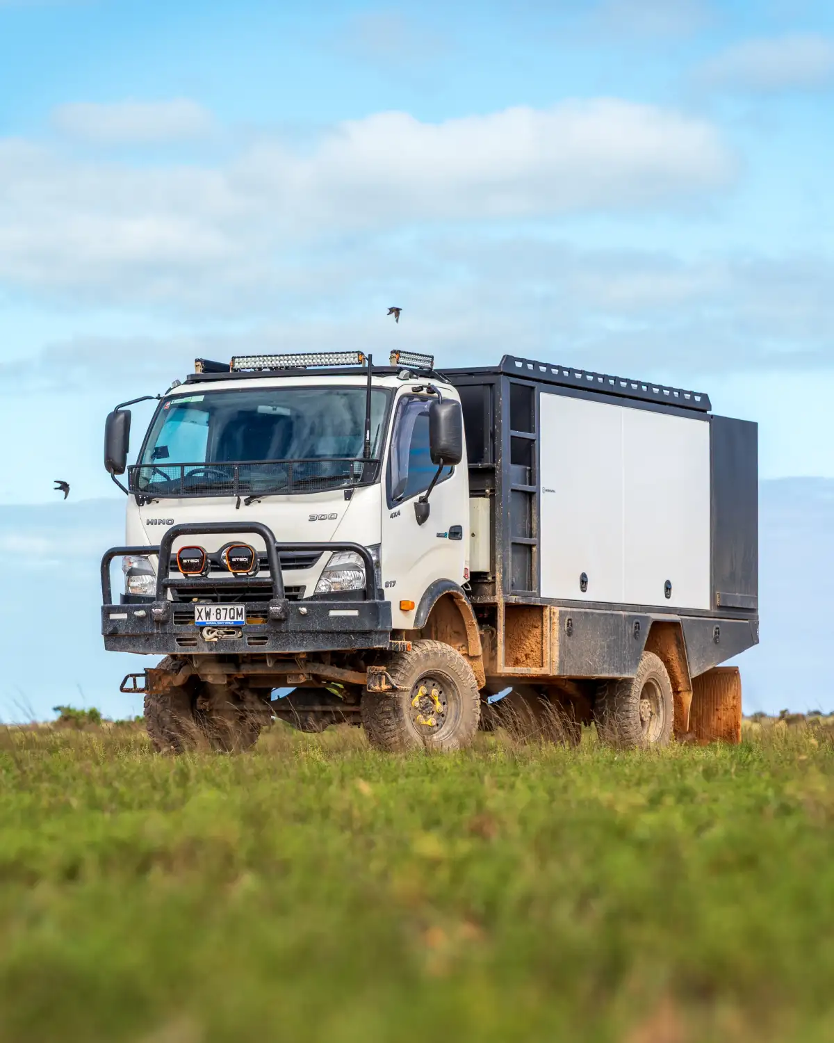 4X4 Hino truck in a field