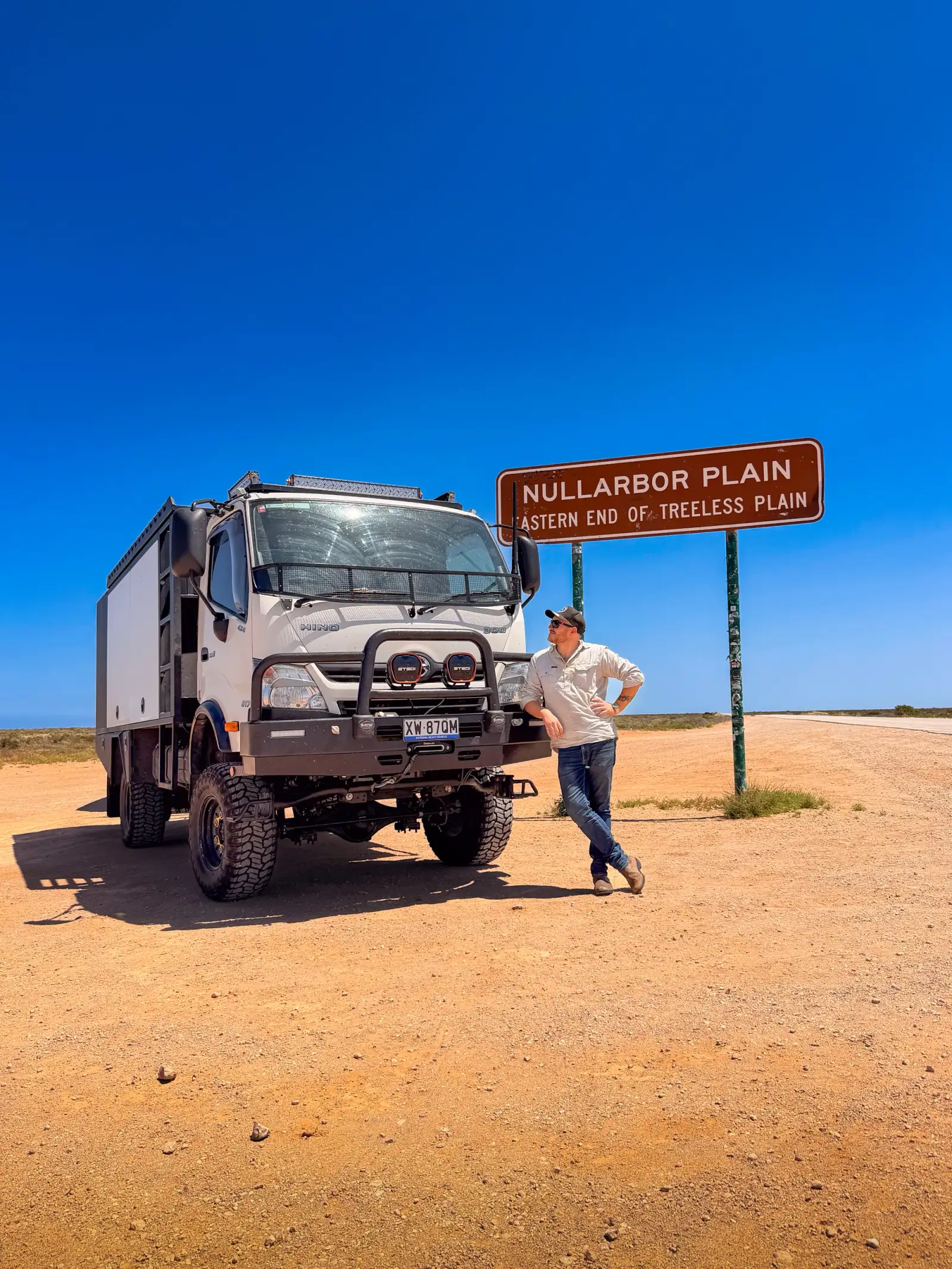 Josh Leonard and his Hino 300 4WD light truck on the Nullarbor Plain