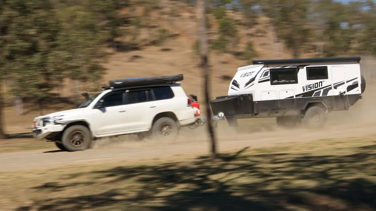 Vision RV hybrid being towed at speed