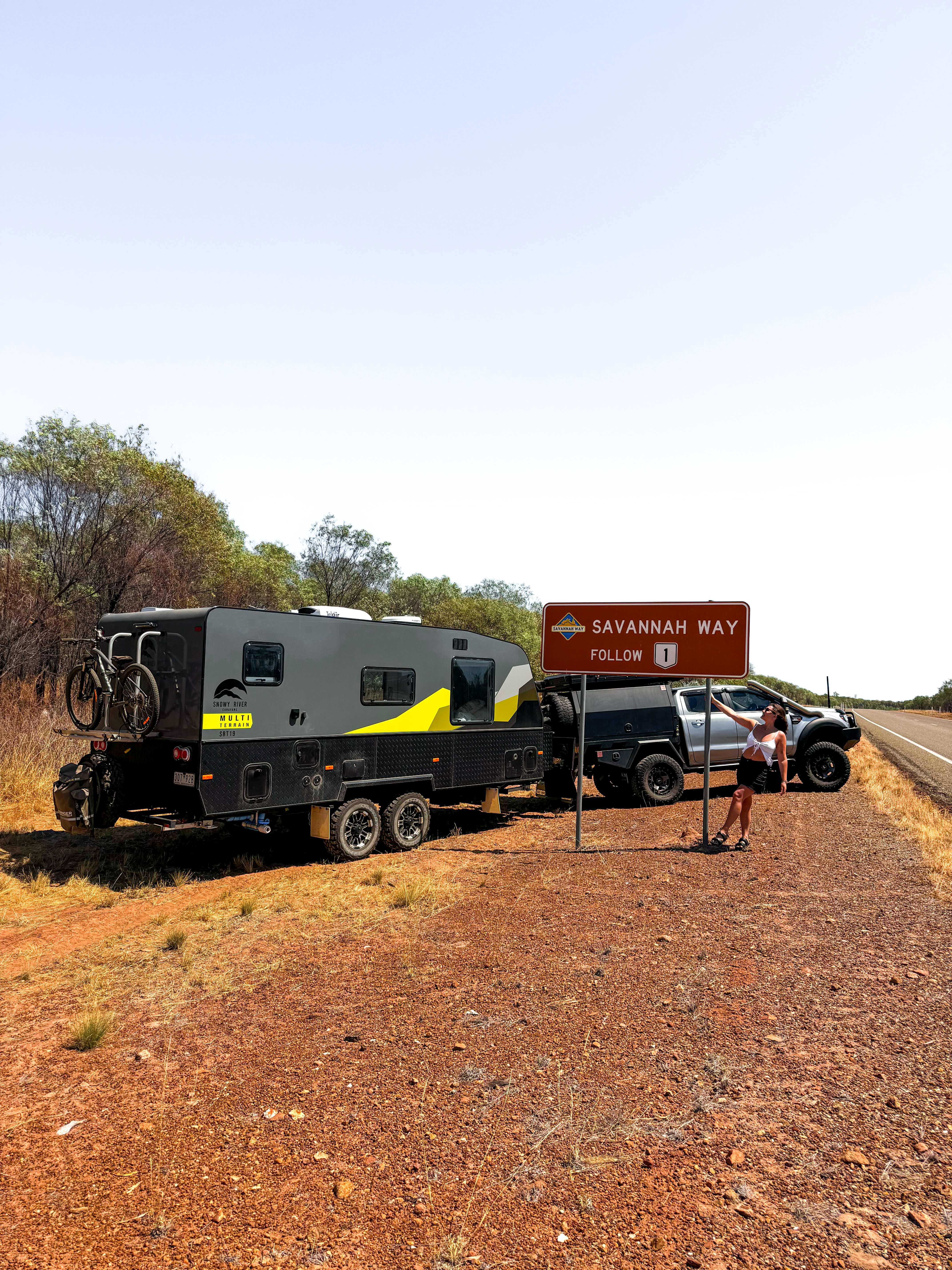 A 4WD in front of a Savannah Way sign