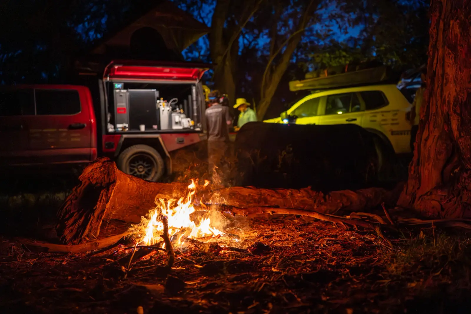 Pat Callinan and his 4X4 Ford F-150 around a campfire in the Outback