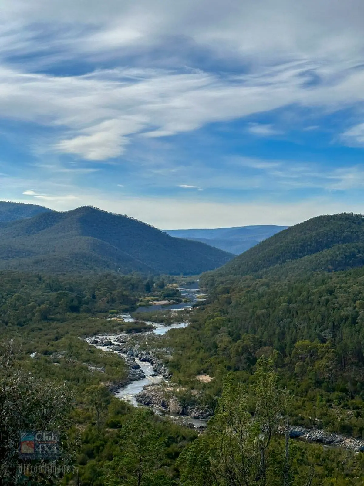 hilly range and river through the barry way