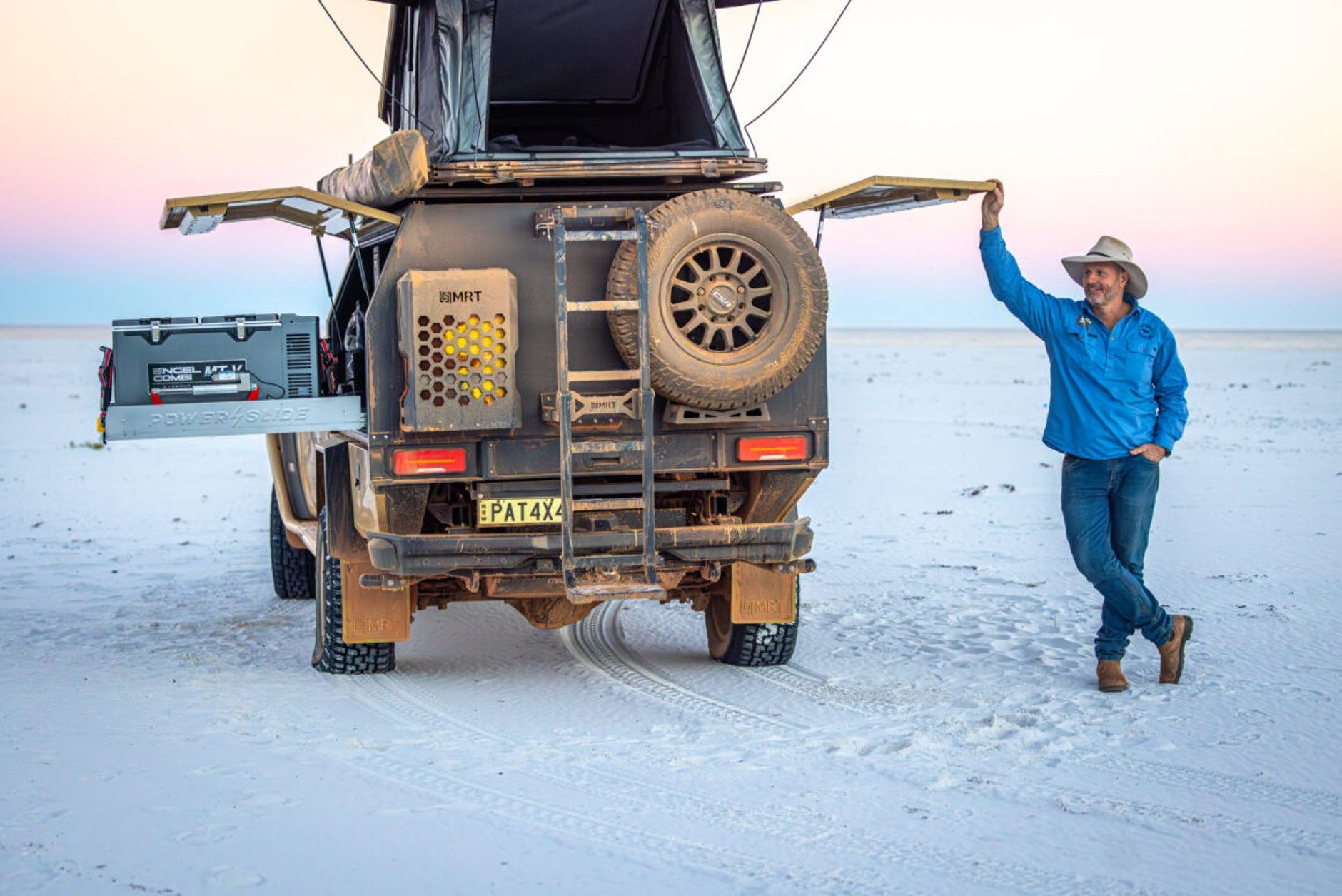 Pat Callinan and his 4X4 on a beach with the canopy open