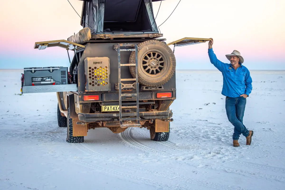Pat Callinan and his 4X4 on a beach with the canopy open