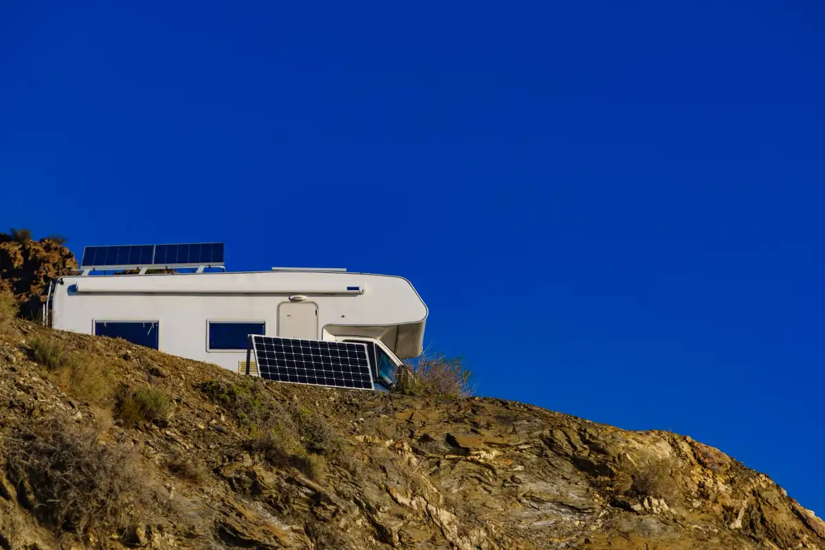 rv on a cliff with solar setup