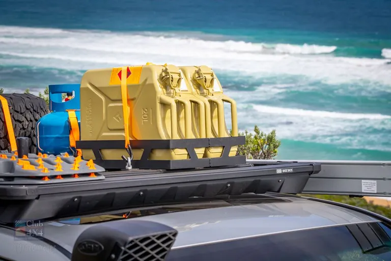 camping with gas bottle and fuel on roof rack 4wd