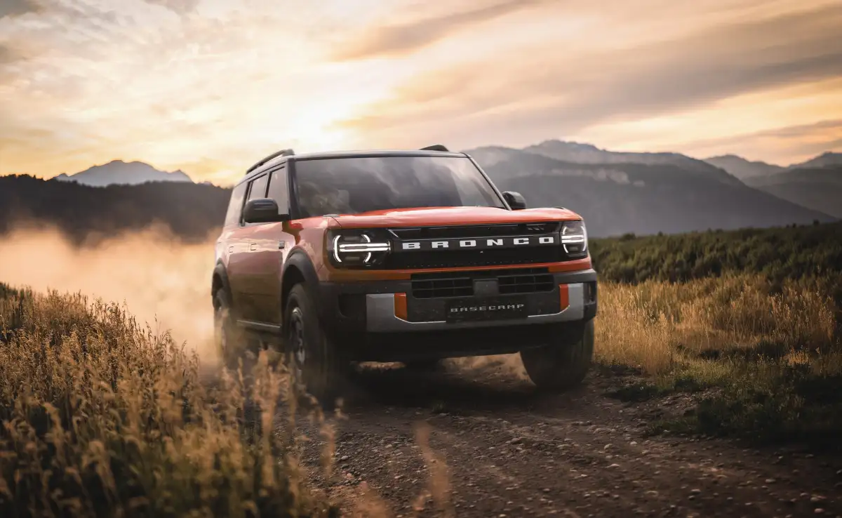2027 Ford Bronco Basecamp driving on a dirt road