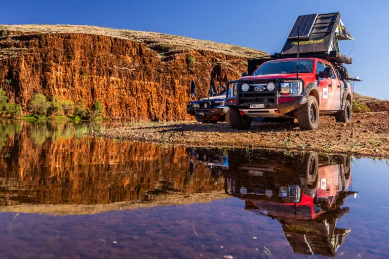camping near a freshwater river crossing in australia