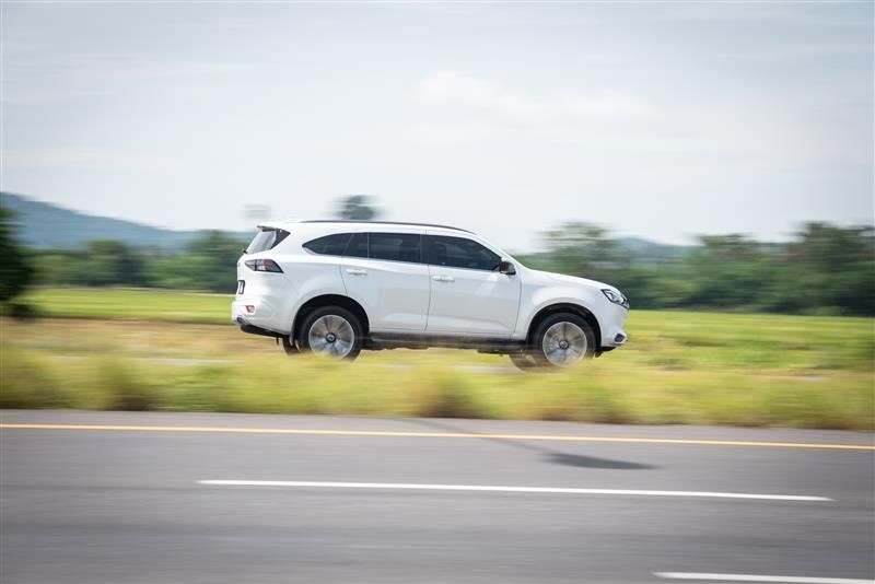 SUV driving on highway with motion blur