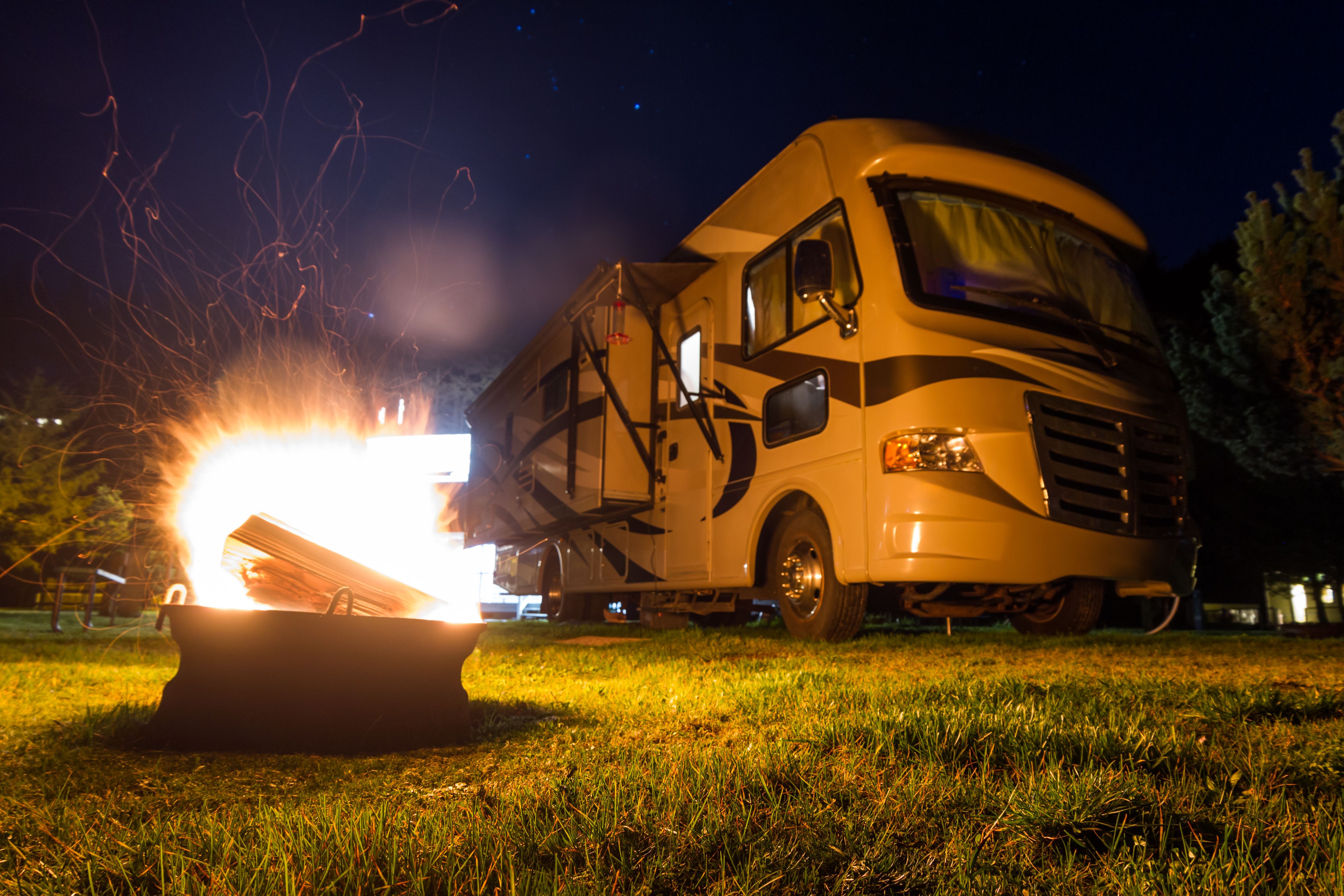 A luxury RV by a fireplace