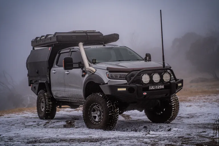 a 4X4 vehicle in the snow