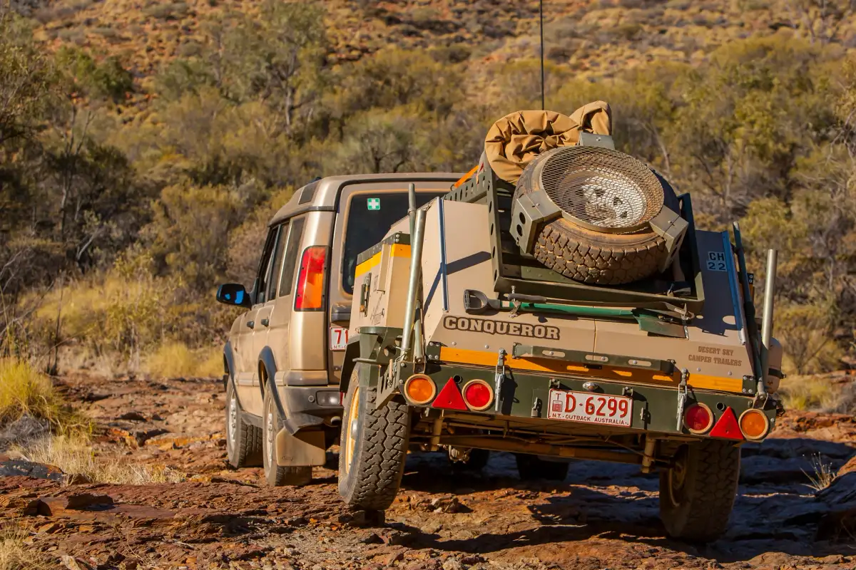 A camper trailer being towed in outback australia