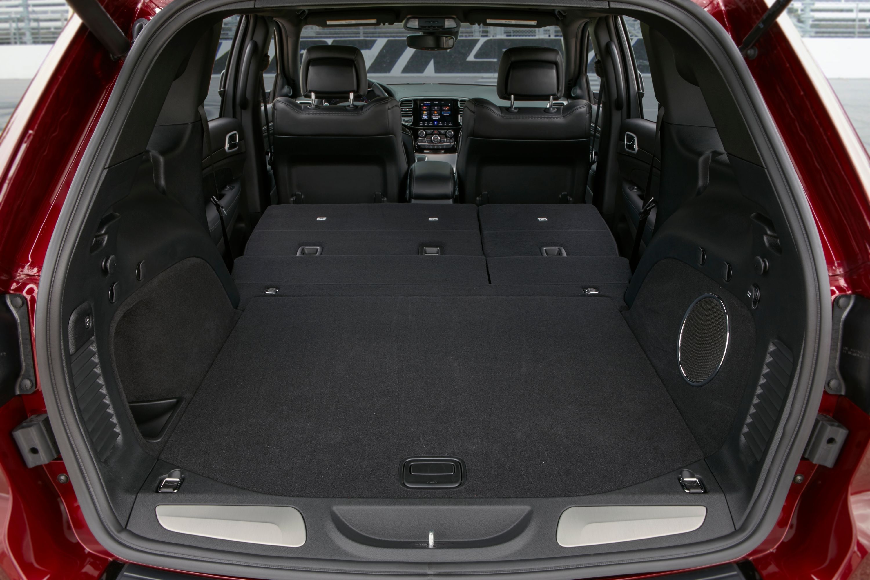 The interior of a Jeep Trackhawk with the back seats folded down