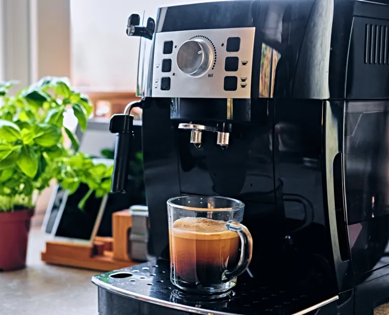 coffee machine with coffee in a kitchen
