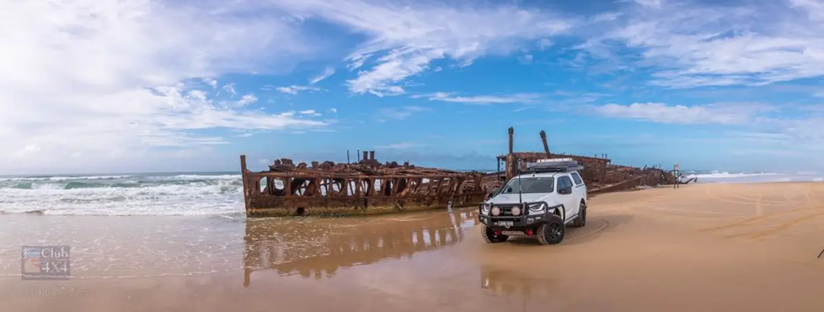 4wd driving on the beach at maheno shipwreck K'gari
