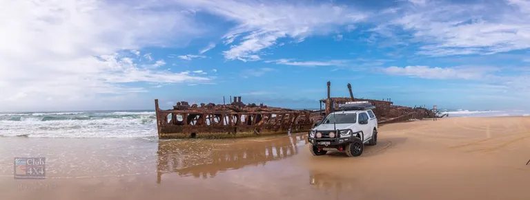 4wd driving on the beach at maheno shipwreck fraser island
