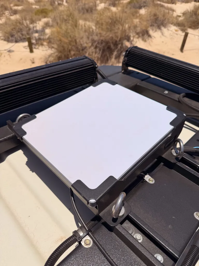 a starlink mounted to the roof of a vehicle