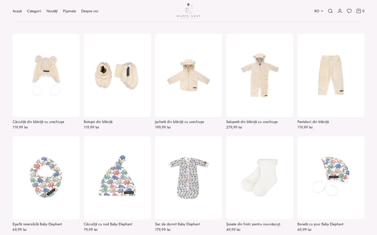Babies collection page with a photo banner, filters and sort bar, and a grid of cream fleece clothing