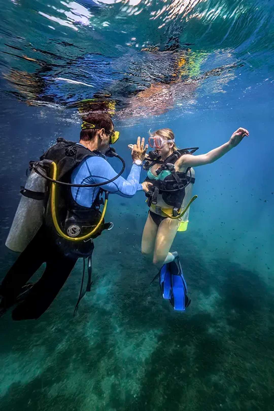 A student taking the PADI Open Water Diver Certification in Cancun.