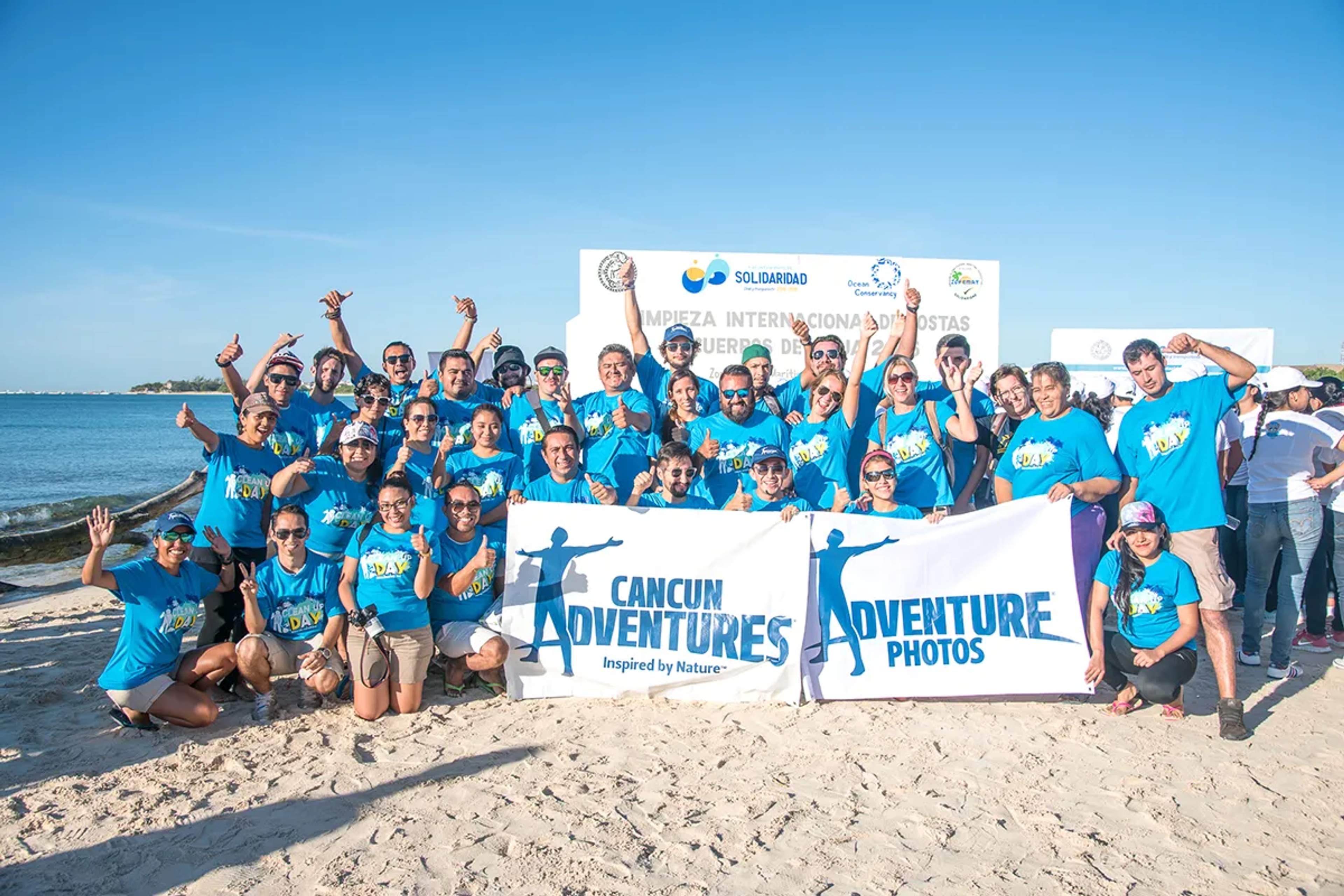 Cancun Adventures team after a beach cleanup.
