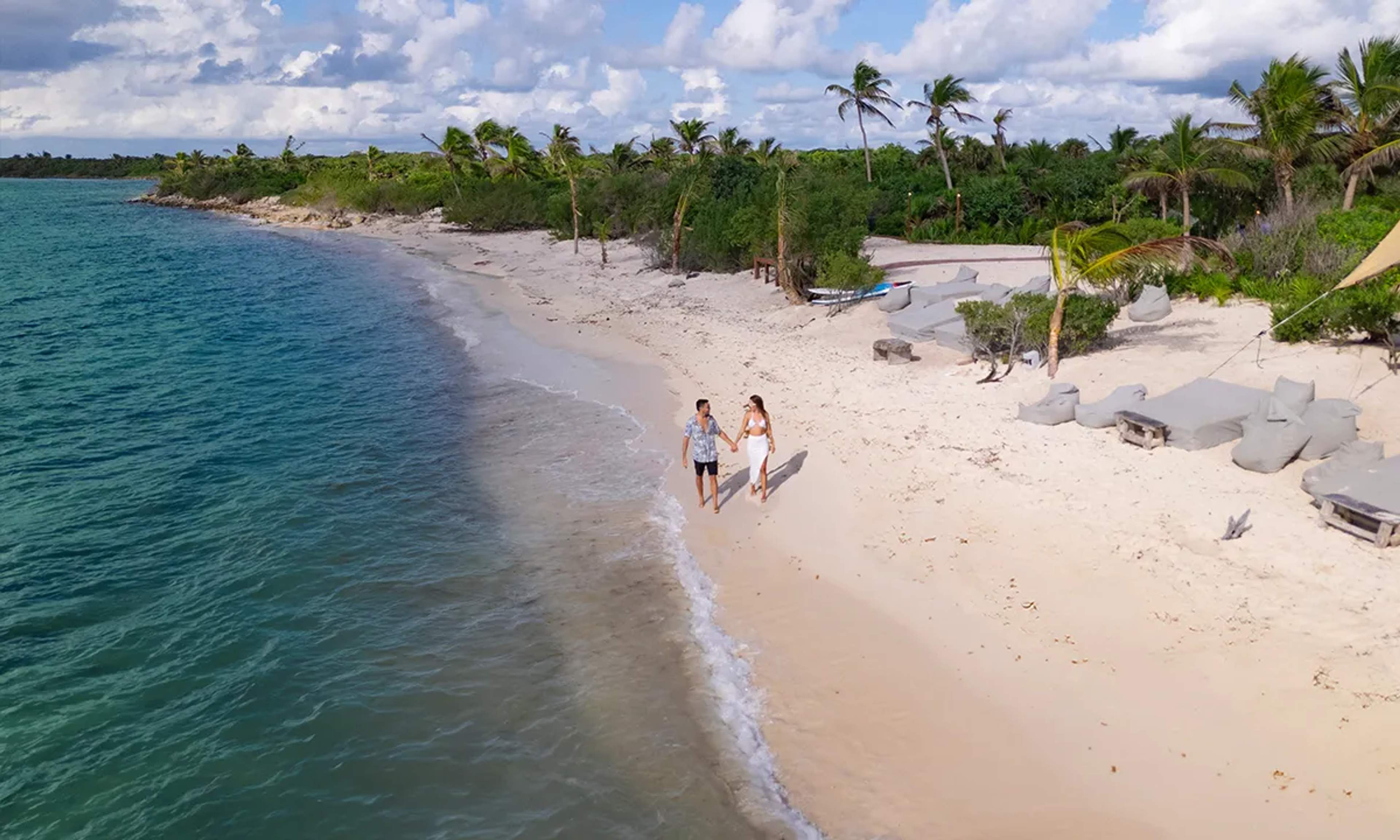 Punta Venado Beach offers serene white sands, turquoise waters, and lush greenery, perfect for relaxing or enjoying water activities