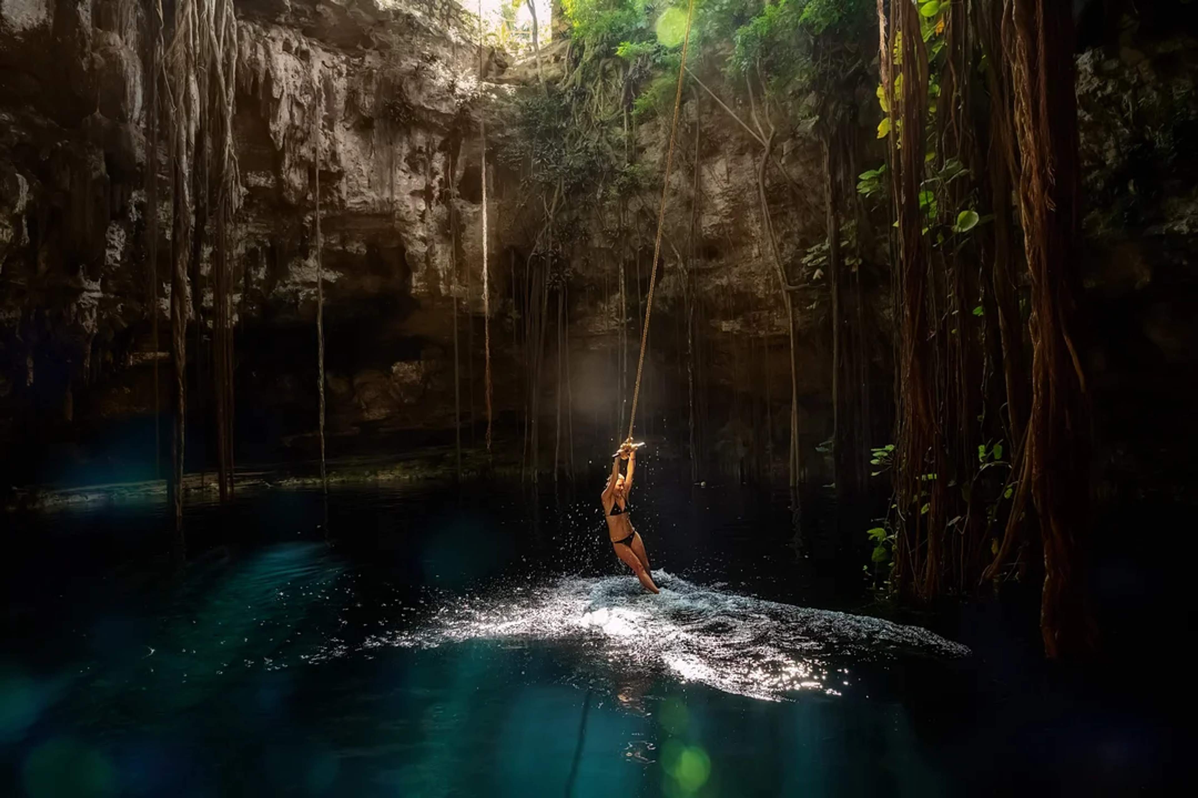 Swing into the magic of a jungle cenote, sunlight, vines, and a refreshing splash await you!