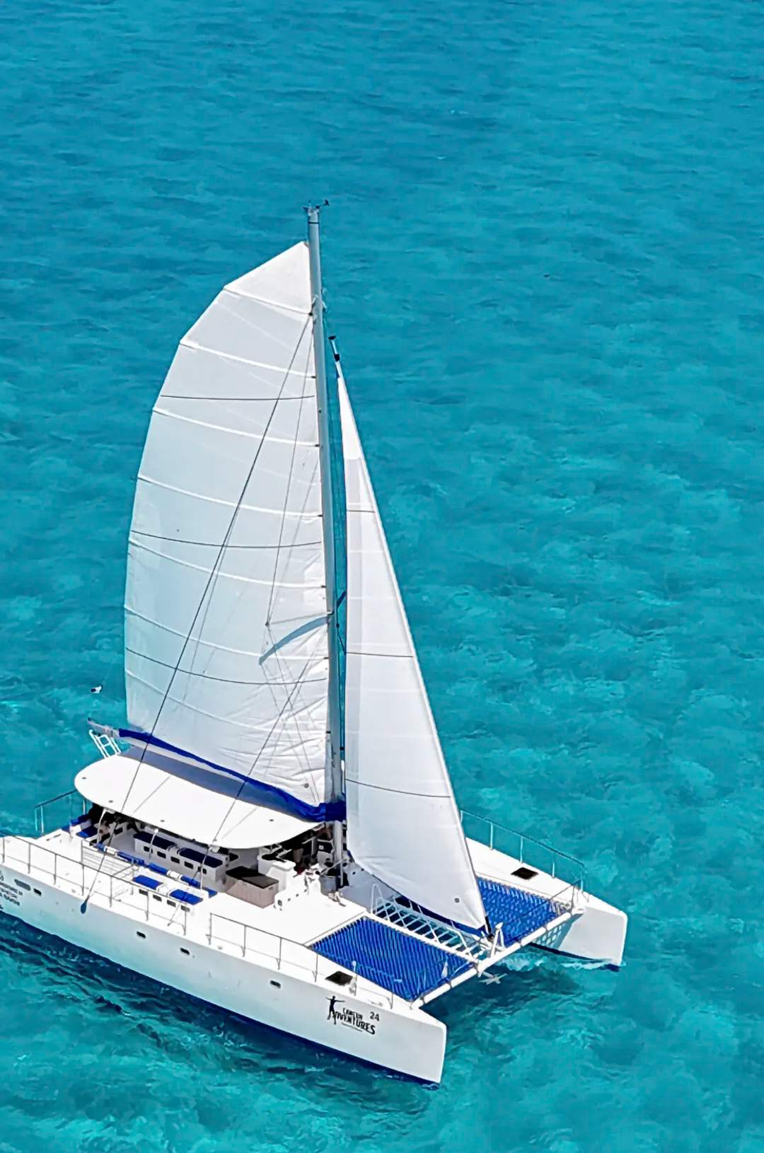 Isla Mujeres All Inclusive Catamaran tour cruising the Caribbean.