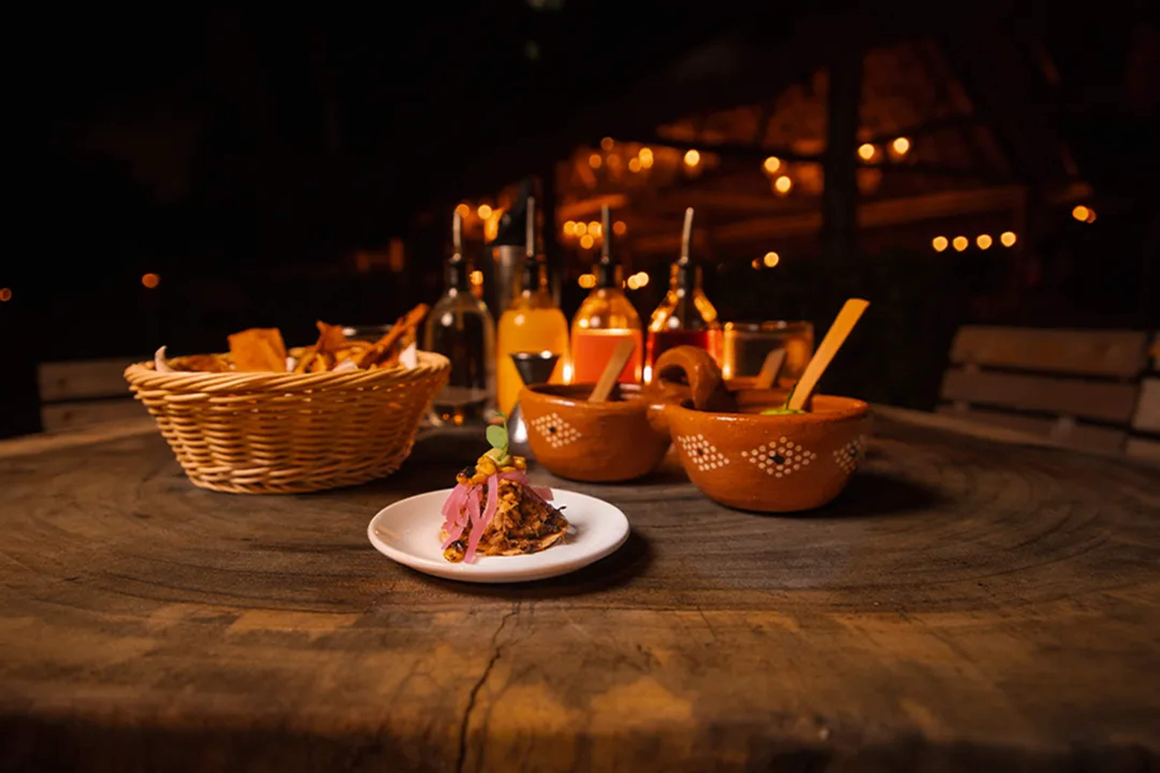 Cozy Cancun restaurant with traditional Mexican food and sauces.