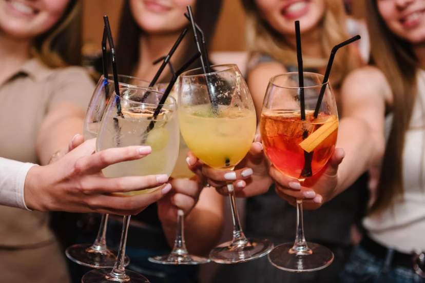 Gruop of girls toasting and partying in Cancun
