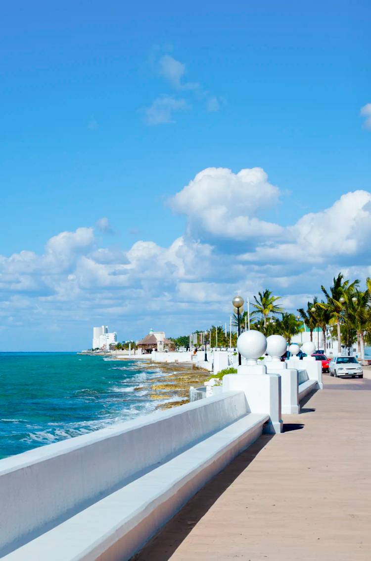 Cozumel boardwalk overlooking the turquoise sea.