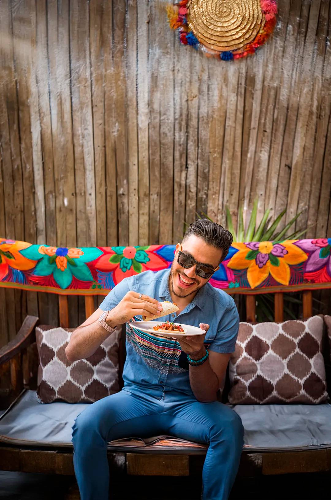 Traveler enjoying tacos in Cancun.