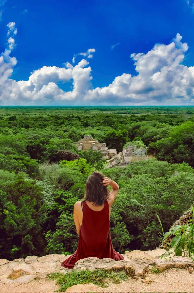 View from the top of a pyramid in Ek Balam, surrounded by jungle.