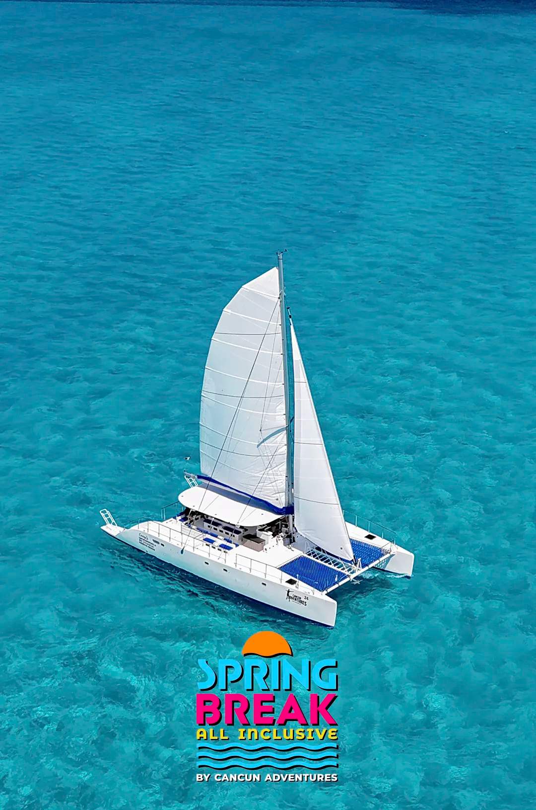A white catamaran sails through crystal-clear turquoise waters, promoting Cancun Adventures' Spring Break tour.