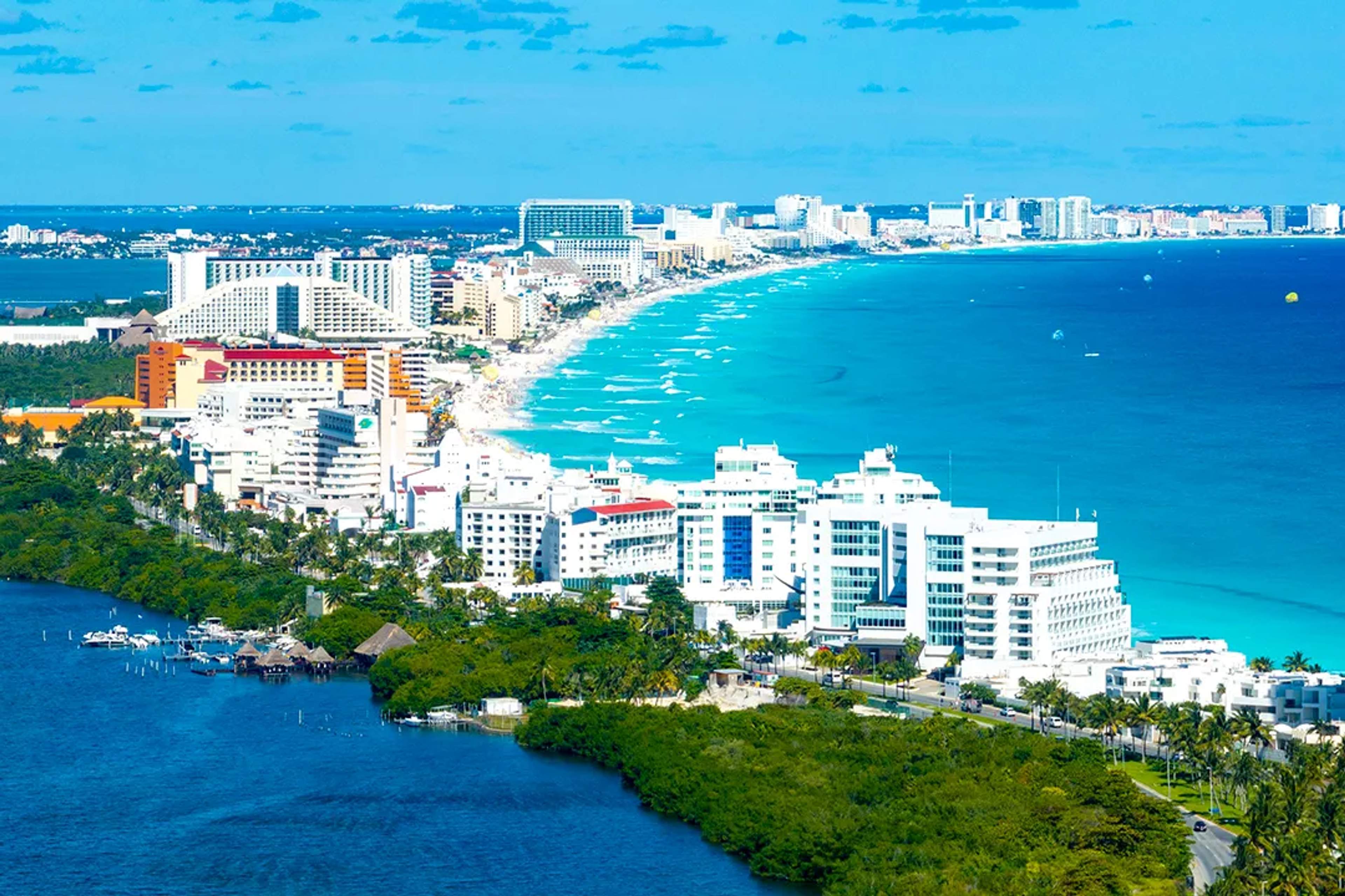 Aerial view of Cancun Hotel Zone with turquoise Caribbean waters and white sand beaches